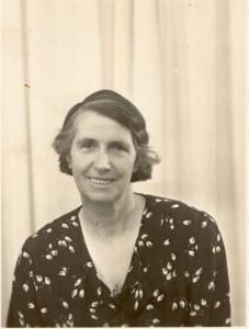 An unusual shot of a middle-aged Annie Britton smiling 