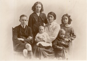 Annie and the Britton kids, 1921. (Left to right): Phil (in Scotch College uniform), Lorna, Ken (on Annie’s lap), Annie, Frank, Eva. 