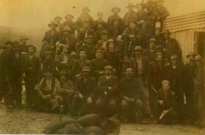 The workforce of the Copper Reward mine, with William Murray centre at front, and engine driver William McArthur seated to his left. Photo courtesy of Edie McArthur.